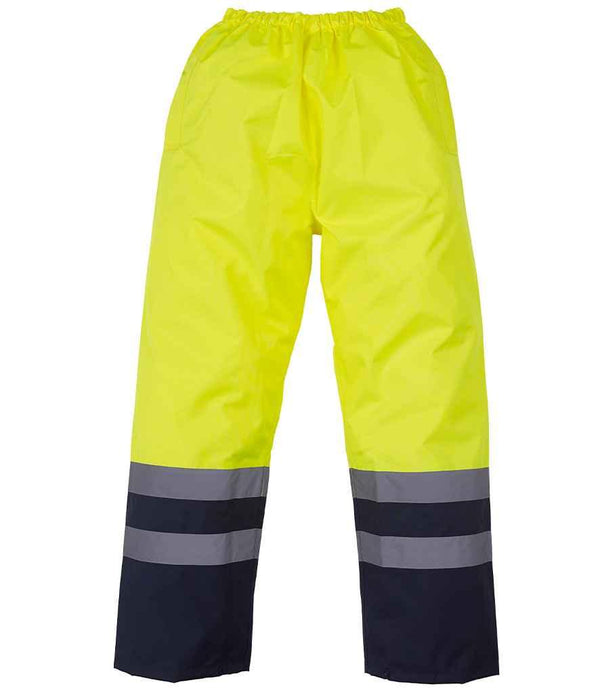 Yoko Hi-Vis Two Tone Waterproof Overtrousers | Yellow/Navy Trousers Yoko hi-vis, Hi-vis Adult, Hi-vis Reflective Border Kids Waistcoat, Hi-vis Tops, Hi-Viz Premium P.E. Bag, style-yk217, workwear, Yoko Schoolwear Centres